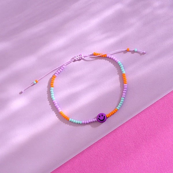 Ava & Yves Perlenarmband „Smile“ lila/orange mit Säckchen - Sausebrause Shop